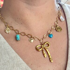 Gold Charm Necklace with Blue Accents